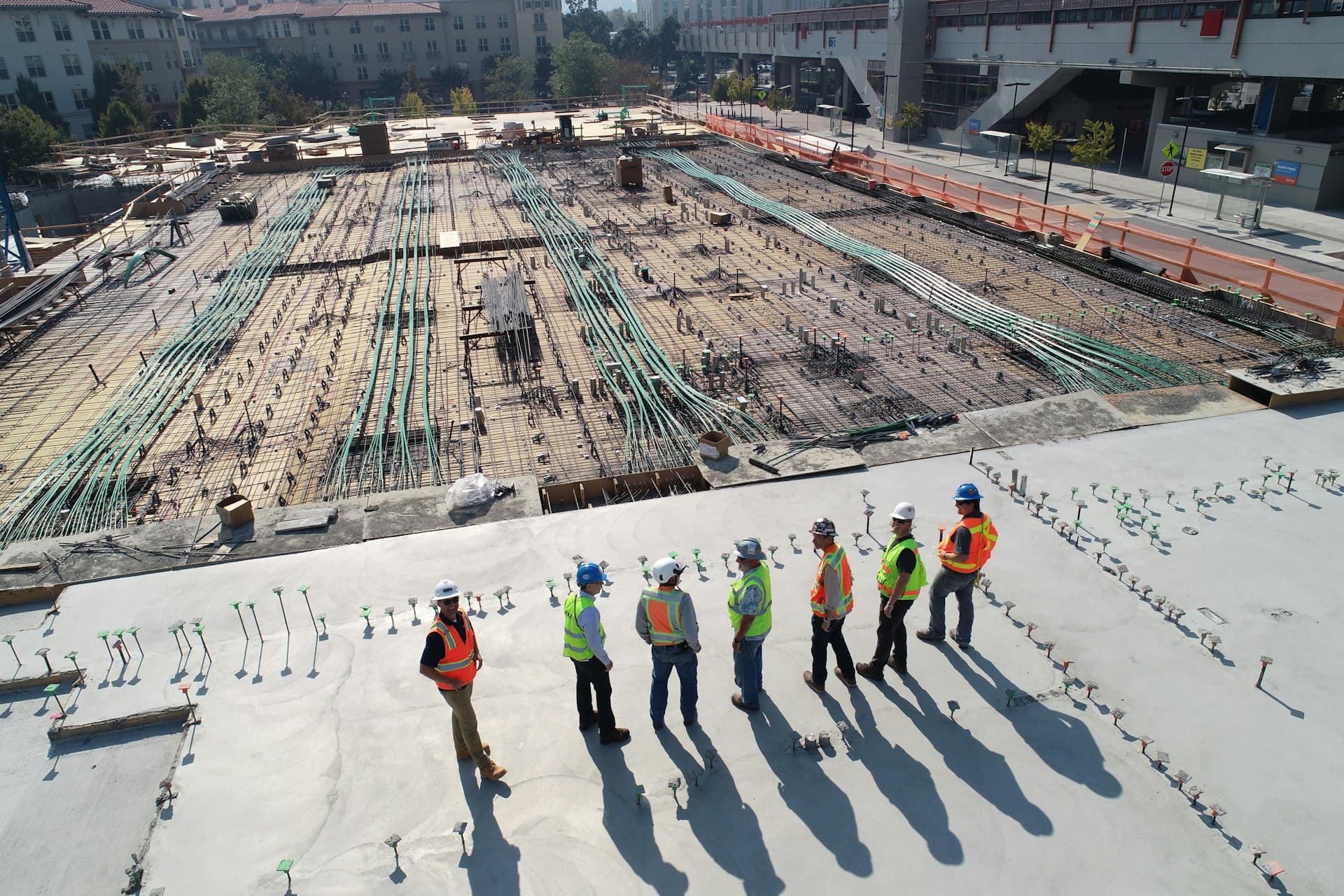 Construction team overlooking site